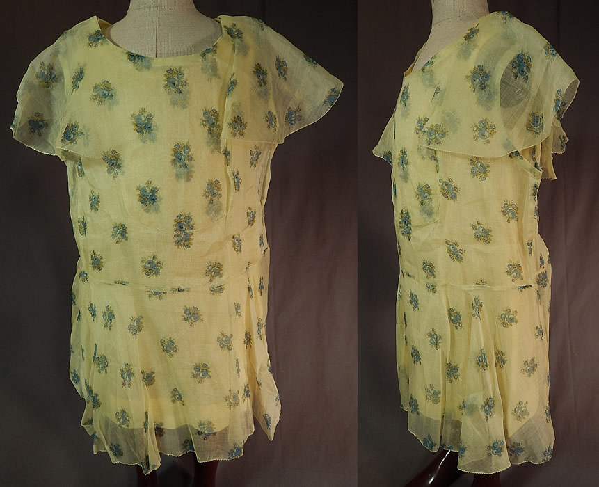 Vintage Girls Yellow Organdy Blue Floral Print Capelet Drop Waist Dress & Slip
This vintage girls yellow organdy blue floral print capelet drop waist dress and slip dates from the 1920s. It is made of a yellow sheer cotton organdy fabric with a blue roses floral print pattern. 
