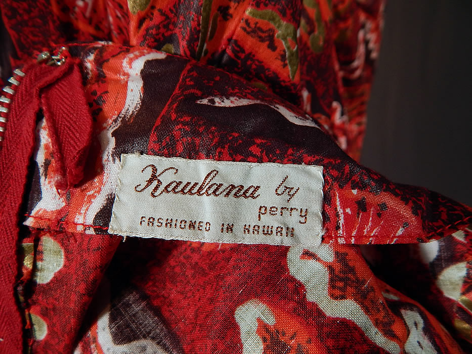 Vintage Kaulana By Perry Hawaiian Polynesian Print Red Cotton MuuMuu Maxi Dress
There is a "Kaulana By Perry Fashioned in Hawaii" label sewn inside. 