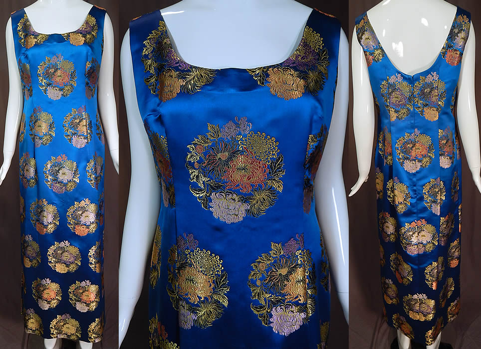 Vintage Blue Silk Chinese Chrysanthemum Brocade Sheath Dress Evening Gown
This vintage blue silk Chinese chrysanthemum brocade sheath dress evening gown dates from the late 1960s. It is made of bright royal blue color luxurious silk satin brocade fabric with a colorful damask weave woven chrysanthemum flower roundels medallions. 