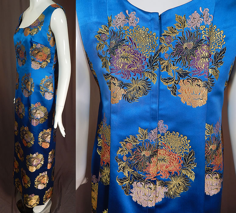 Vintage Blue Silk Chinese Chrysanthemum Brocade Sheath Dress Evening Gown
This beautiful blue Chinese inspired evening gown maxi dress has a fitted wiggle sheath style, is a long floor length with side slits on the skirt, sleeveless, low rounded scoop necklines, a back zipper closure and is unlined. 