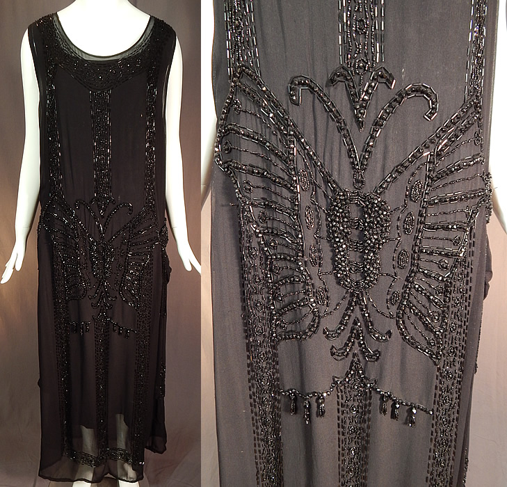 Vintage Art Deco Black Silk Beaded Butterfly Fringed Flapper Dress
This amazing Art Deco vintage black silk beaded butterfly fringed flapper dress dates from the 1920s. It is made of a black sheer silk chiffon fabric, with black jet beading creating a large beautiful beaded butterfly on both the front and back.
