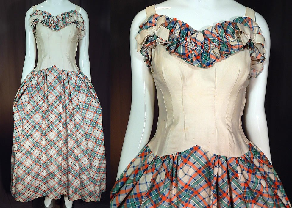 Vintage White Cotton Pastel Plaid Print Ruffle Flounce Bow Trim Maxi Dress
This vintage white cotton pastel plaid print ruffle flounce bow trim maxi dress dates from the 1940s. It is made of a white cotton fabric with a colorful blue, green, peach pastel plaid print pattern design.