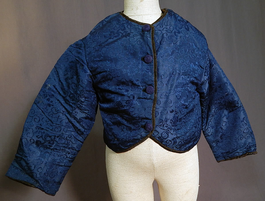 Victorian Antique Chinese Blue Silk Damask Brocade Quilted Boys Child Coat Jacket
This Victorian era antique Chinese blue silk damask brocade quilted boys child coat jacket dates from the late 19th century.