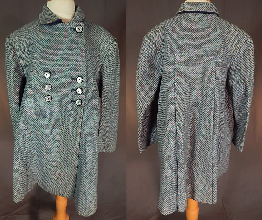 Vintage Girls English Blue Pink Tweed Wool Double Breasted Childs Swing Coat
This vintage girls English blue, pink tweed wool double breasted child's swing coat dates from the 1950s. It is made of blue, with pink and green flecks tweed woven wool fabric.