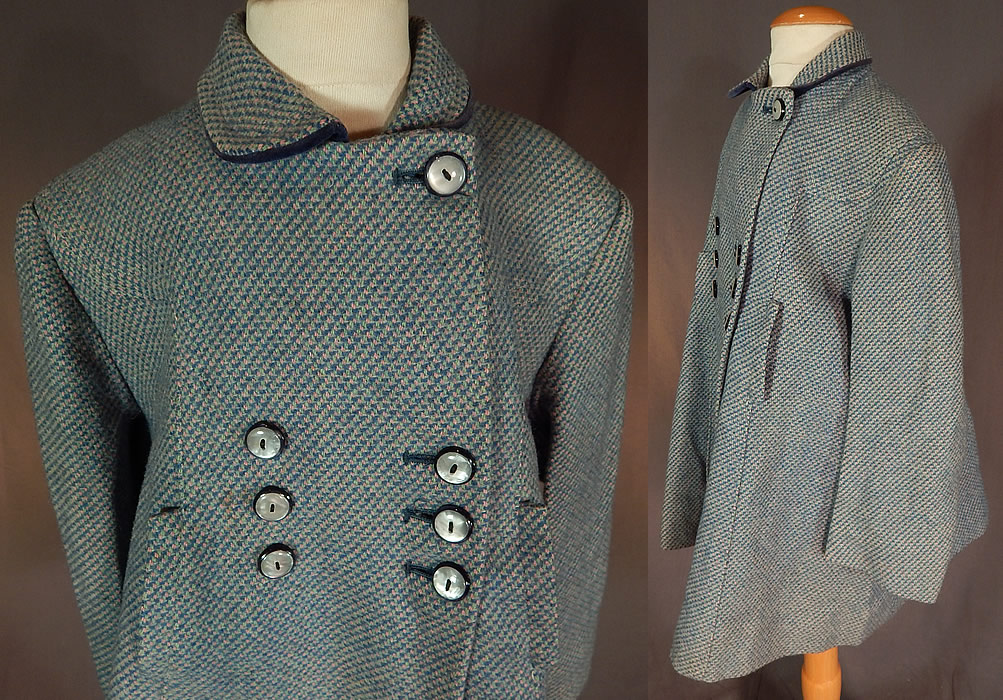 Vintage Girls English Blue Pink Tweed Wool Double Breasted Childs Swing Coat
This little girls winter coat has a loose fitting swing style, with a pleated back panel. is a long mid length, with peter pan collar, front slit pockets, slight shoulder padding, long full sleeves, double breasted with blue button closures and is fully lined. 