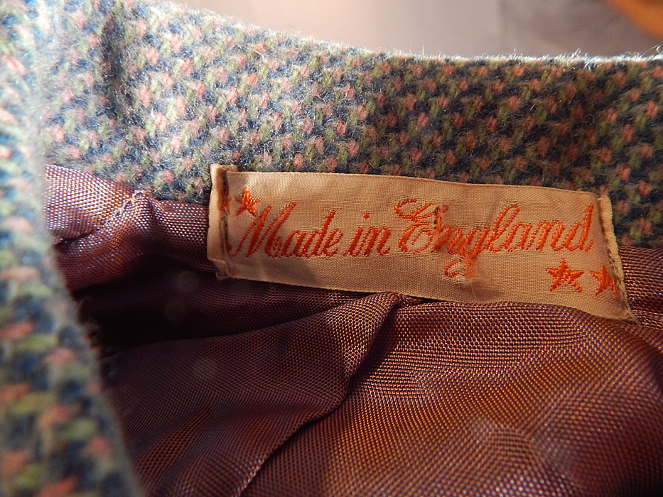 Vintage Girls English Blue Pink Tweed Wool Double Breasted Childs Swing Coat
There is a "Made in England" label sewn inside. The coat measures 20 inches long, with a 28 inch chest, 14 inch long sleeve and 10 inch back. It is in excellent condition. This is truly a wonderful piece of children's wearable art!
