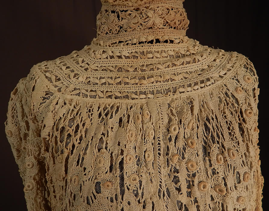 Edwardian Antique Cream Cluny Bobbin Lace Peplum Blouse Shirt Top
This beautiful blouse has a high neck lace collar, long full sleeves with tapered fitted cuffs, a linen fabric peplum skirted bottom hem, hook closures down the back and is fully lined in a sheer Swiss dot tulle net fabric inside. The top measures 17 inches long, 24 inches long with the additional skirted bottom, a 38 inch bust, 28 inch waist, 23 inch long sleeves, 14 inch back and 16 inch neck. 