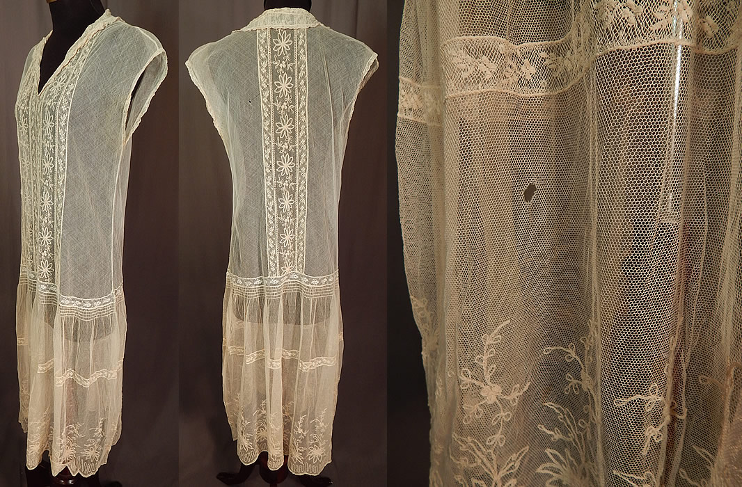 Vintage Cream Tambour Embroidery Lace Net Drop Waist Chemise Shift Dress
This lovely lace chemise style shift dress is loose fitting, has a drop waist, short full skirt, fold over collar with V front neckline, sleeveless and is sheer, unlined. The dress measures 43 inches long, with a 36 inch bust, 34 inch waist and 36 inch hips.