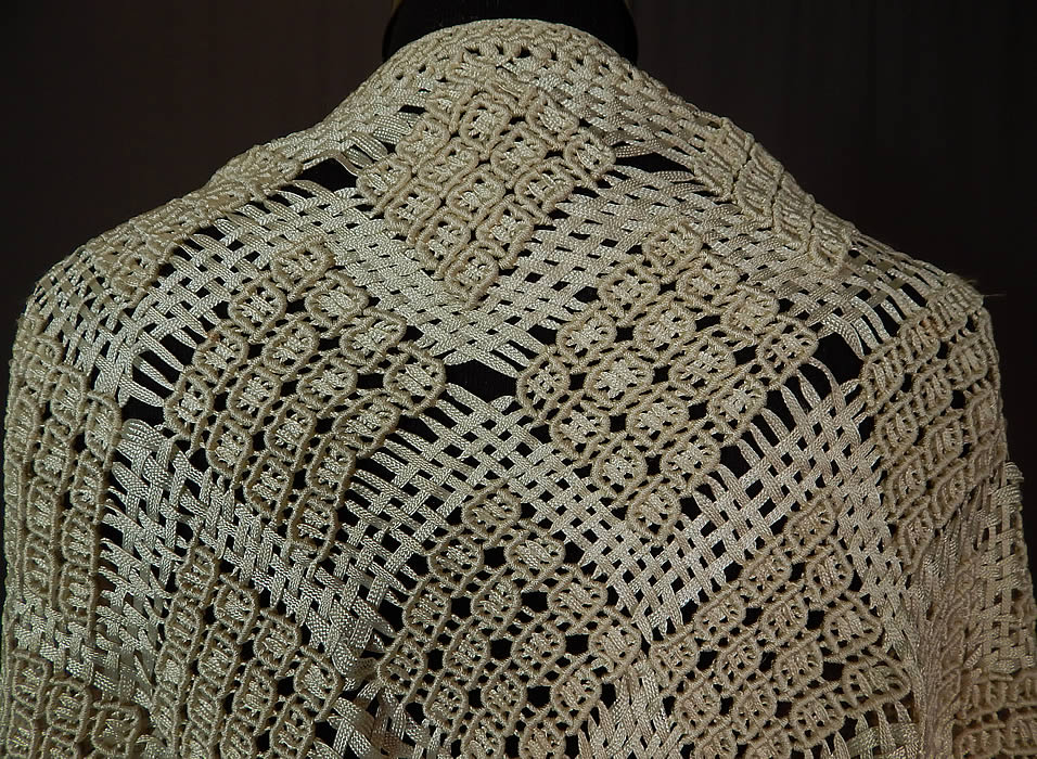 Vintage White Boho Macrame Crochet Silk Ribbon Fringe Flapper Wedding Shawl
The shawl measures 54 inches wide across the top, 27 inches long in the center and has 16 inch long fringe. It is in excellent condition. This is truly a wonderful piece of wearable boho textile art! 