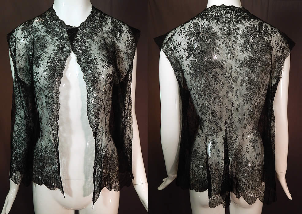 Victorian Antique Black Chantilly Lace Shawl Sleeveless Vest Jacket Top
This antique Victorian era black Chantilly lace shawl sleeveless vest jacket top dates from the 1860s. It is made of a sheer fine delicate black net French Chantilly lace, with a Swiss dot, floral foliage leaf pattern outlined in black threads with detailed shading effects and a decorative scalloped border edging. This lovely lace has a lush floral foliage design throughout.