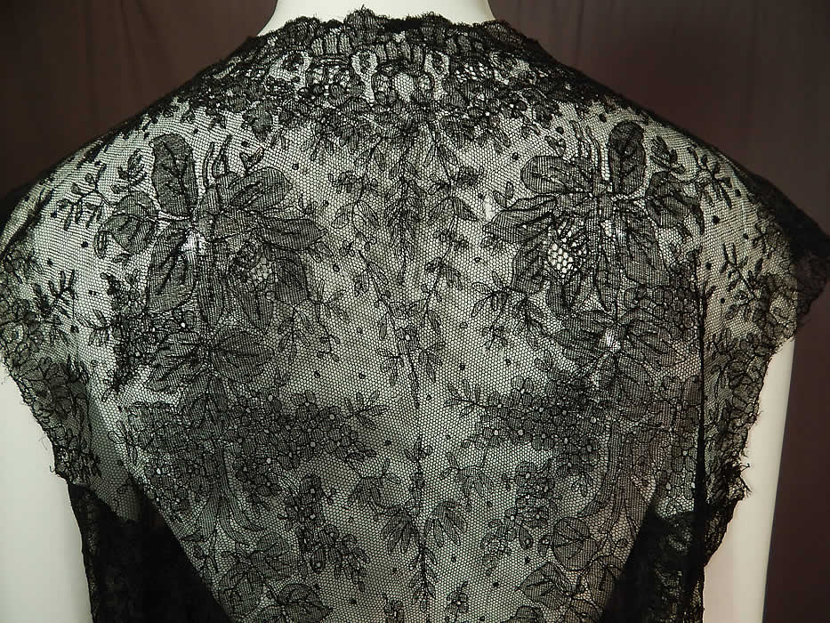 Victorian Antique Black Chantilly Lace Shawl Sleeveless Vest Jacket Top
It has been created into a loose fitting, waist length, open front, sleeveless vest style blouse jacket, with no closure and is sheer, completely unlined. 