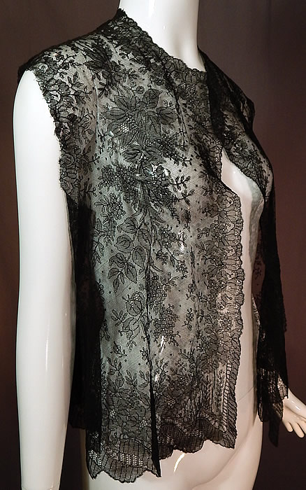 Victorian Antique Black Chantilly Lace Shawl Sleeveless Vest Jacket Top
The top measures 22 inches long, with a 40 inch bust and 42 inch waist.