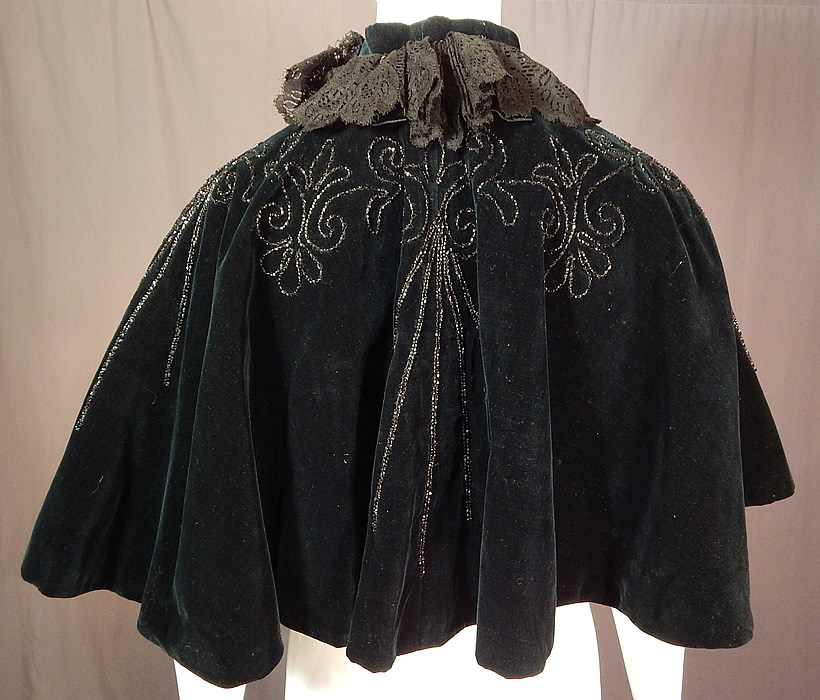 Victorian Midnight Blue Velvet Jet Beaded Lace Trim Cloak Cape Capelet
The cape measures 17 inches long, 18 inches across the back shoulders and has a 15 inch neck. 