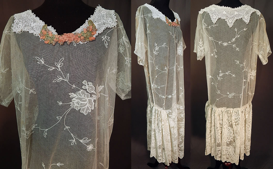 Vintage White Net Tambour Embroidery Lace Collar Rosette Trim Drop Waist Dress
This lovely lace drop waist dress is loose fitting, with a lace trimmed collar, rosette trimmed neckline, short sleeves, side gathering on the skirt and is sheer, unlined.