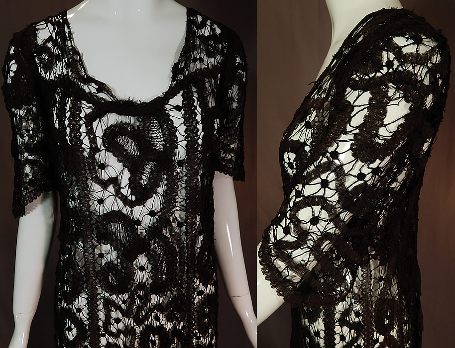 Vintage Antique Handmade Sheer Black Battenburg Bobbin Tape Lace Dress
This lovely lace dress has a long, loose fitting, straight shift style, with a low scoop neckline, short sleeves with scalloped trimmed cuffs coming to a point, an over the head style with no side opening closures and is sheer, unlined.