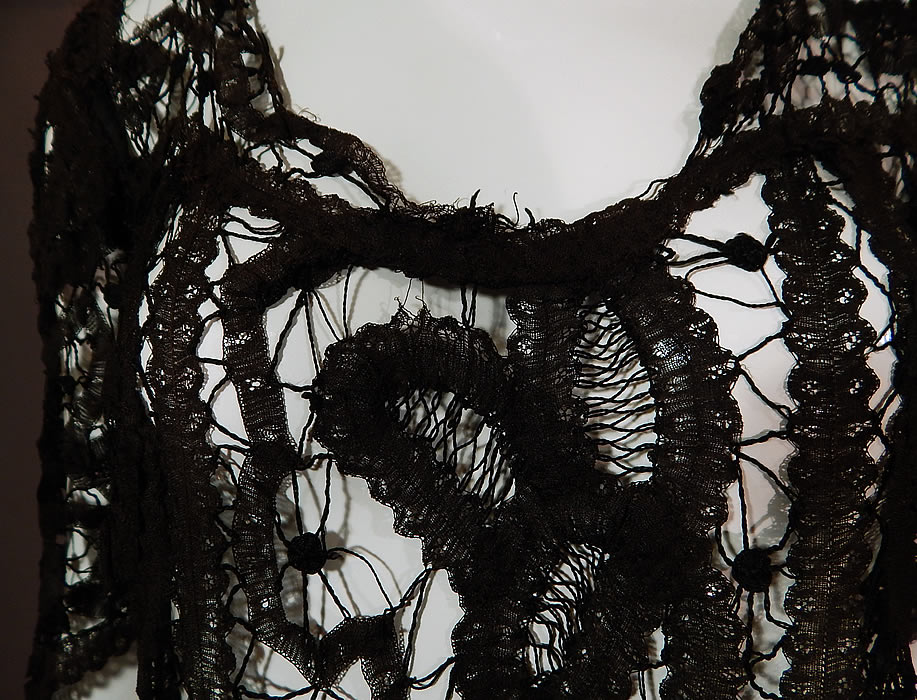 Vintage Antique Handmade Sheer Black Battenburg Bobbin Tape Lace Dress
It is in good as-is condition, with only a few small frayed breaks in the lace. This is truly an exceptional piece of antique lace wearable art!