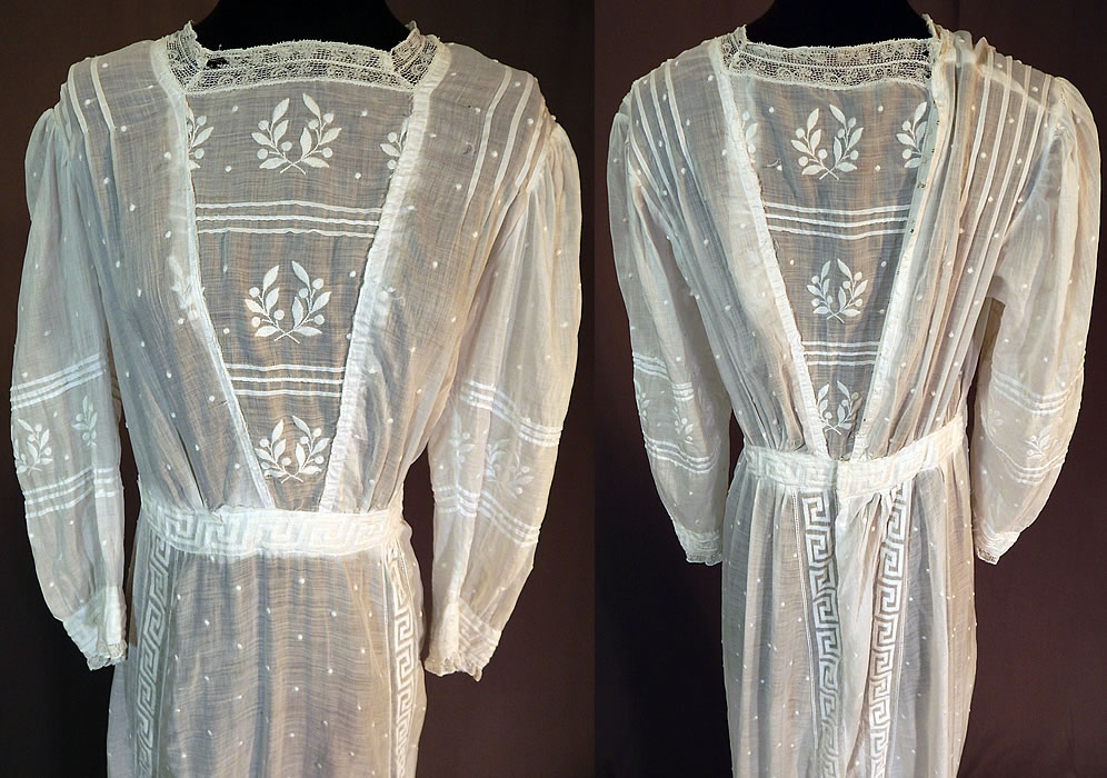 Edwardian Embroidered White Cotton Batiste Laurel Greek Key Polka Dot Embroidered Dress
This lovely lace lawn dress tea gown is floor length with a scalloped bottom hemline skirt, lace trim high neckline, gathered shoulders, long full sleeves, a fitted waistband, hook closures down the back and is sheer, unlined.