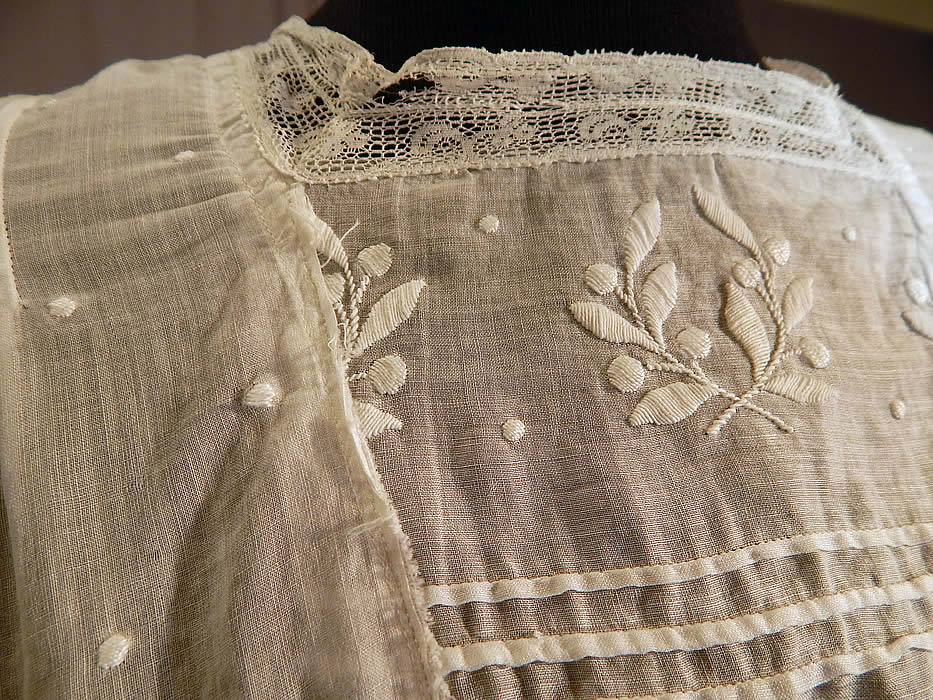 Edwardian Embroidered White Cotton Batiste Laurel Greek Key Polka Dot Embroidered Dress
It is in good condition, with only a small frayed hole in the lace neckline trim and side skirt (see close-ups). This is truly a wonderful piece of wearable antique lace art which could be worn as a wedding or graduation dress!