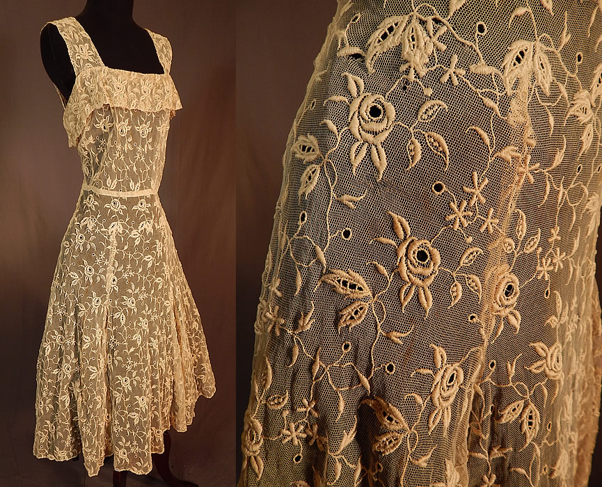 Vintage Cream Tulle Net Eyelet Embroidered Floral Lace Circle Skirt Sun DressThis lovely lace summer sun dress has a full circle skirt, fitted waist, embroidered shoulder straps with flounce ruffle trim neckline, side snap closures and is sheer, unlined. 