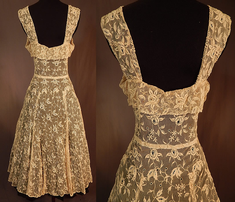 Vintage Cream Tulle Net Eyelet Embroidered Floral Lace Circle Skirt Sun Dress
The dress measures 46 inches long, with a 36 inch bust, 30 inch waist and 48 inch hips. It is in good as-is condition, has not been cleaned with a few faint small age spot stains and tiny pin holes scattered. This is truly a wonderful piece of wearable lace art!
