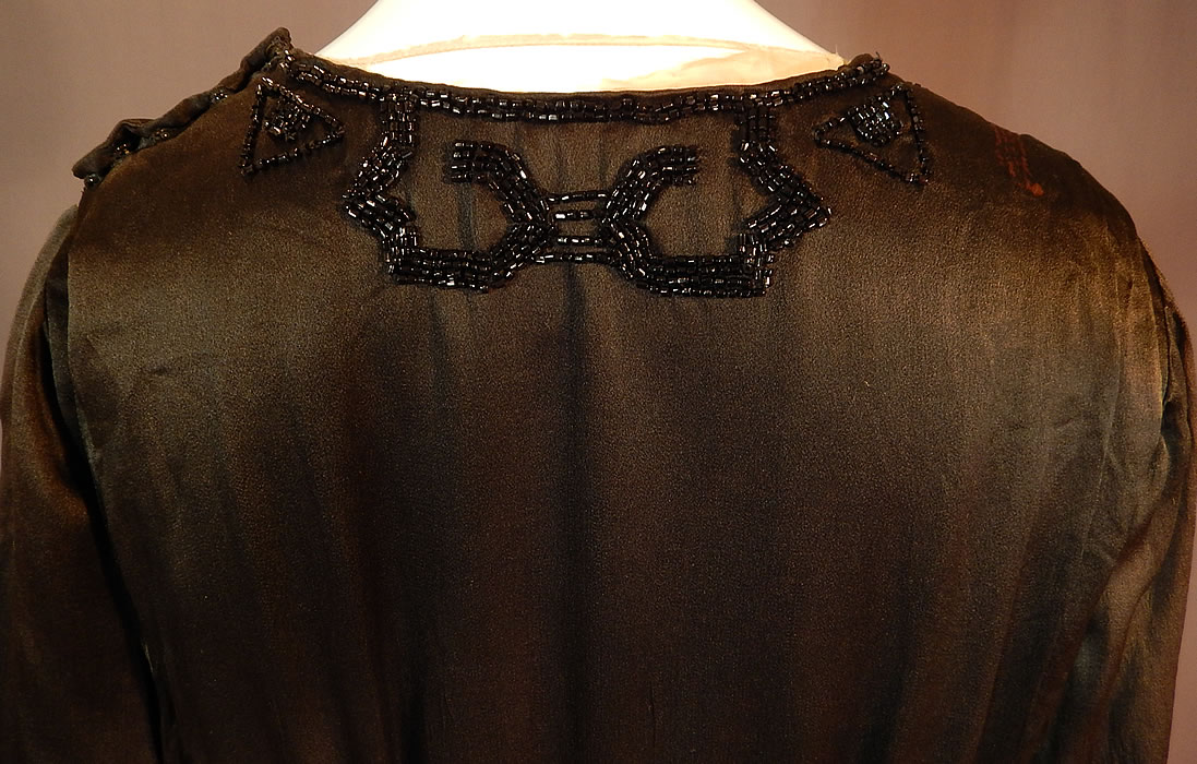 Vintage Art Deco Black Silk Pyramid Beaded Watteau Back Drape Flapper Dress
This is truly a wonderful piece of Art Deco beaded textile art!