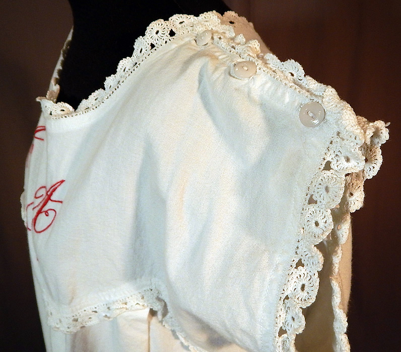 Victorian White Cotton Turkey Red Embroidered AA Chemise Nightgown Smock Dress
The nightgown measures 46 inches long, with a 44 inch bust, 60 inch waist, 60 inch hips and 12 inch circumference arm holes. It is in excellent condition. This is truly a wonderful piece of antique Victoriana underpinnings wearable art!