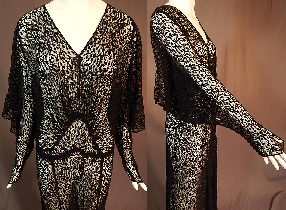 Vintage Art Deco Sheer Black Lace Batwing Bias Cut Evening Gown Gothic Dress
This gorgeous goth gown has a form fitting bias cut, is a long floor length, with batwing flared sleeves which have open slits along the arms and come to a point at the fitted button cuffs, a key hole opening on the front neckline, no side opening closure and is sheer completely unlined.