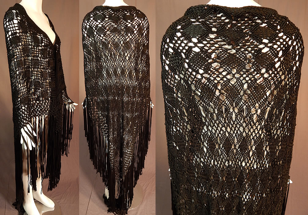 Vintage Black Gothic Silk Ribbon Macrame Crochet Hand Knot Fringe Boho Shawl
This fabulous flapper shawl stole scarf wrap has a large triangle shape, with hand knotted black silk fringe along the bottom and is sheer, unlined. 
