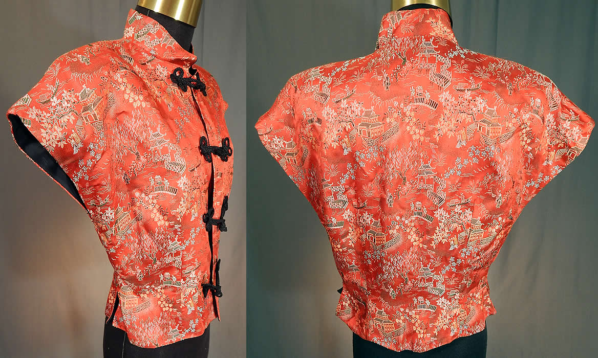 Vintage Original Ina Mae of Hollywood Chinese Red Silk Brocade Blouse Top
This beautiful blouse top has a short crop style, with broad shoulder padding, short cap sleeves, a mandarin collar, fitted waist, black braided rope knotted button toggle closures down the front and is fully lined in a black nylon fabric. 