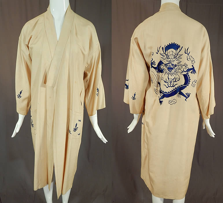 Vintage Antique Chinese Dragon Blue Embroidered Pongee Raw Silk Kimono Robe
This vintage antique Chinese dragon blue embroidered pongee raw silk kimono robe dates from the 1920s. It is made of a natural ecru color pongee raw silk fabric, with blue silk embroidered stitched clouds of smoke, dragons, pearls and flames.