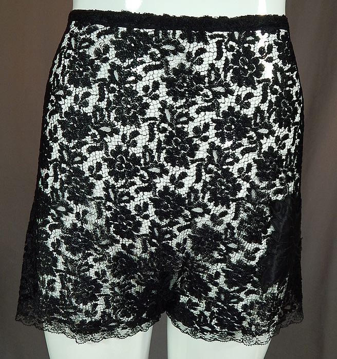Vintage Eve's Leaves by Chevette Lingerie Black Lace Silk Fig Leaf Applique Tap Panties
The "Eve's Leaves by Chevette" label has been cut out leaving only a small white remnant on the back waist. The panties measure 14 inches long, with a 28 inch waist and 36 inch hips.