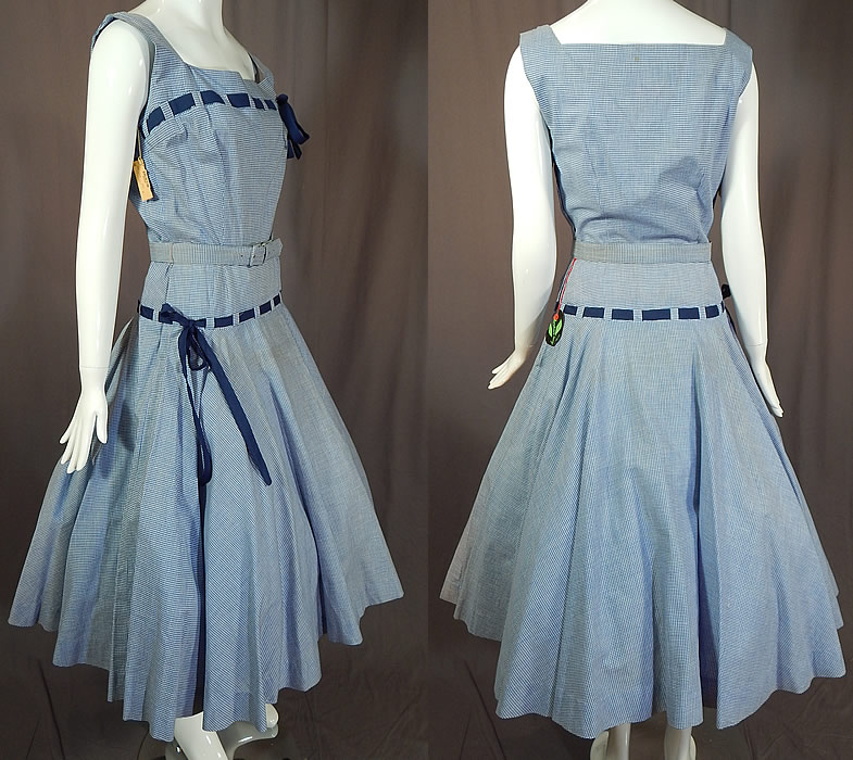 Vintage Henry Rosenfeld Blue White Cotton Check Gingham Belted Circle Skirt Dress NWT
This beautiful blue sun dress has a fit and flare style, with a full circle skirt, fitted drop waist, matching fabric buckle belt, sleeveless, squared neckline, side zipper closure and is unlined.