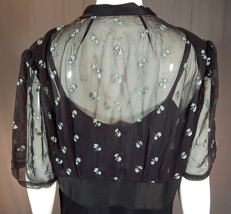 Vintage Blue Embroidered Flowers Black Silk Jersey Maxi Evening Gown Dress
The dress is a large size measuring 60 inches long, with a 44 inch bust, 36 inch waist, 46 inch hips and 17 inch back.