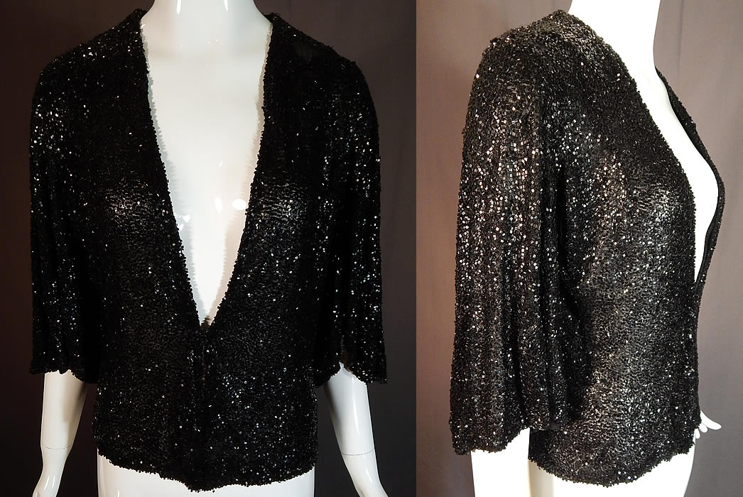 Vintage Art Deco Fully Black Beaded Flapper Evening Coat Crop Bolero Jacket
This beautiful black beaded evening coat short crop bolero jacket is waist length, with an open V front neckline, two hook closures on the bottom front, full flared wide sleeves and is fully lined. 
