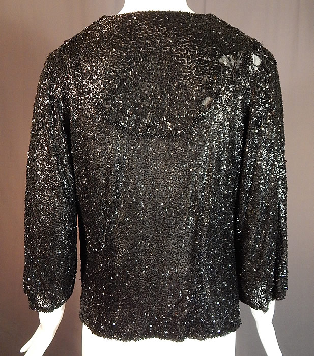 Vintage Art Deco Fully Black Beaded Flapper Evening Coat Crop Bolero Jacket
This amazing Art Deco vintage fully black beaded flapper evening coat crop bolero jacket dates from the 1930s. 