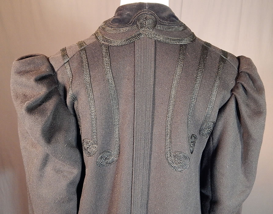 Victorian Black Wool Velvet Soutache Trim Womens Winter Frock Coat
This antique Victorian era black wool velvet soutache trim womens winter frock coat dates from 1890. It is in good condition, with only some slight wear, fraying on the silk buttons. This is truly a beautiful quality made piece of wearable antique Victoriana womens textile art! 