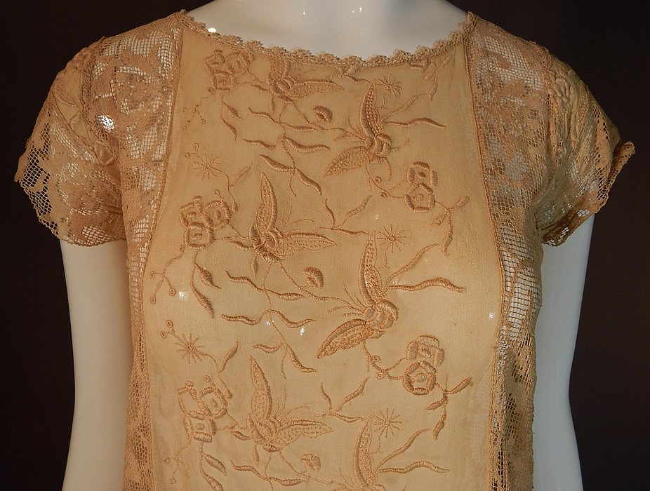 Vintage Butterfly French Knot Embroidered Ecru Silk Filet Lace Chemise Shift Dress
This lovely lace loose fitting chemise style straight shift dress has short cap lace sleeves and is sheer, unlined. 