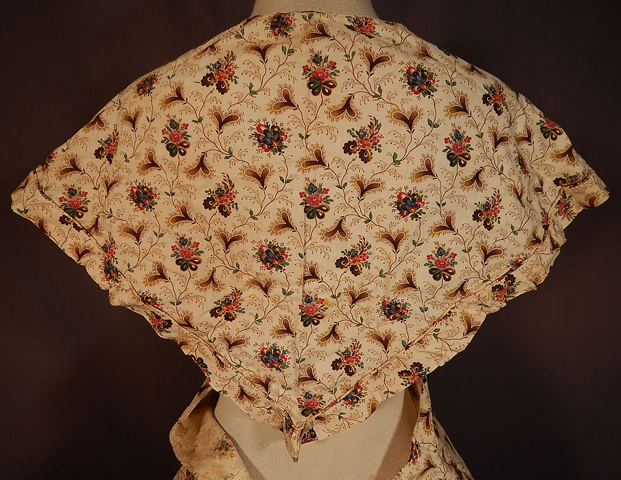 Victorian Chintz Calico Floral Heart Print Skirt Fabric Fichu Pelerine Shawl Cape
Included is an unfinished skirt fabric which has been sewn together, closed in the back and is missing the pleated gathering around the waist and waistband. It has a long floor length full hoop skirt style (hoop not included underneath), missing the back closures and is lined only along the bottom hem dust ruffle underneath.