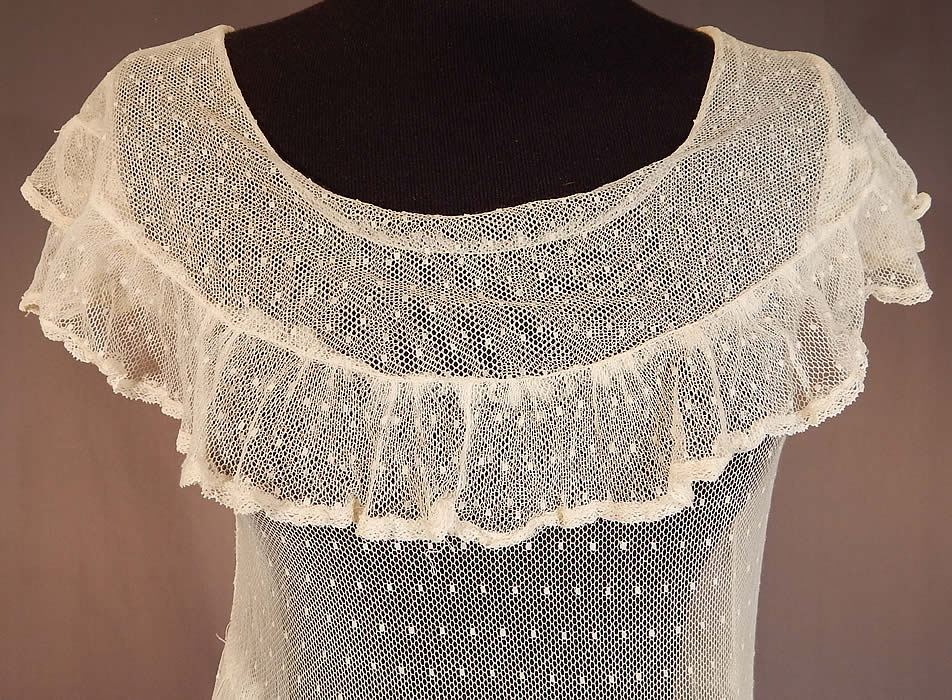Vintage Swiss Polka Dot White Tulle Net Lace Shawl Collar Capelet Dress
This lovely lace adolescent, youth size dress has a shawl style collar capelet, cap sleeves, a fitted waist, ruffle trim edge skirt and is sheer, unlined.