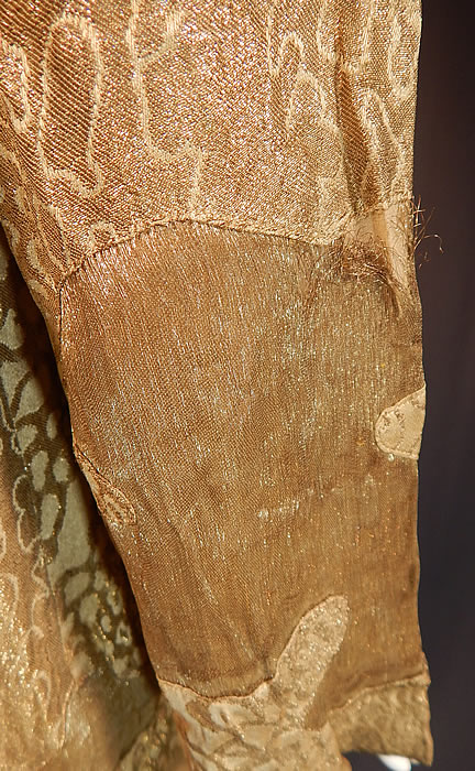 Vintage Art Deco Applique Pattern Gold  Lame Long Flapper Coat Jacket
It is in good as-is condition, with some fraying along the gold lam&eacute; trim edging the neck, front opening and a small fray on each sleeve (see close-ups). This is truly a rare and amazing piece of wearable Art Deco textile art! 