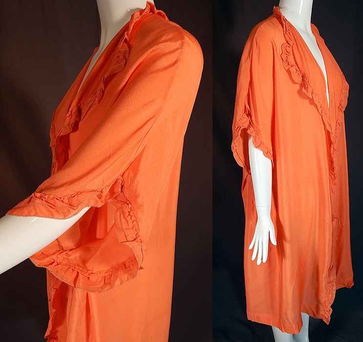 Vintage Orange Silk Ruffle Boudoir Lingerie Flapper Peignoir Dressing Gown Robe
This lovely lingerie peignoir dressing gown robe is loose fitting, with a fold over lapel collar, 3/4 length sleeves, an open front with no closure and is unlined. 