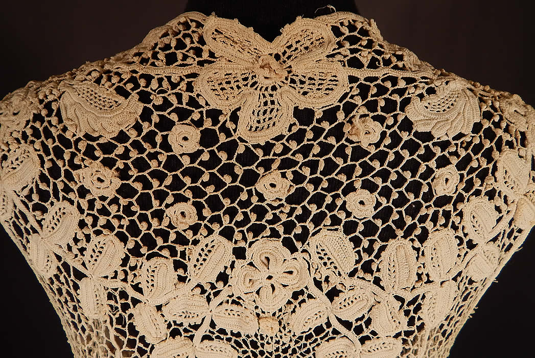 Edwardian Antique White Irish Crochet Lace Long Sleeveless Vest Jacket
It is in excellent condition. This is truly a rare and exceptional, quality made piece of wearable antique Irish crochet lace art!