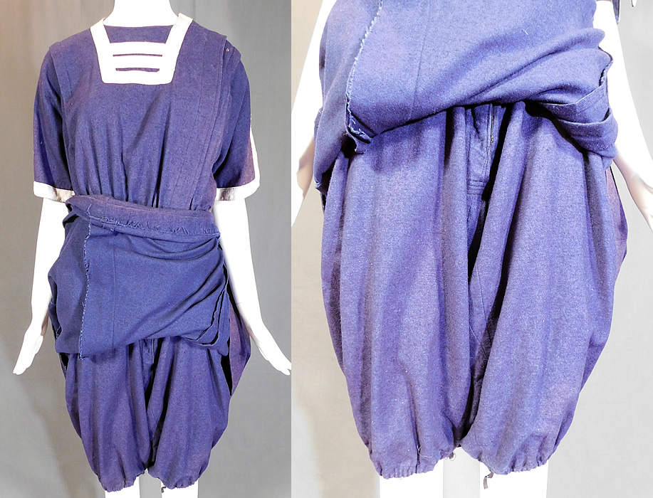 Edwardian Blue Flannel Wool Bathing Beauty Costume Swimsuit Dress & Bloomers
This wonderful women's old fashioned bathing suit one piece romper swimsuit dress has a white trim yoke, short sleeves with a side slit opening, bloomer pantaloon pants with gathered leg cuffs attached underneath the skirt, front side, waist skirt hook closures and is unlined.
