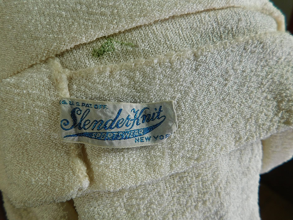 Vintage Slender Knit Sportswear NY Floral Embroidered Cardigan Sweater
There is a "Slender Knit Sportswear New York" label sewn inside the bottom hem. 