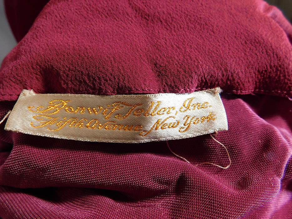Vintage Bonwit Teller NY Burgundy Red Velvet Gold Soutache Trim Gown Dress
There is a "Bonwit Teller, Inc. Fifth Avenue New York" department store label sewn inside.