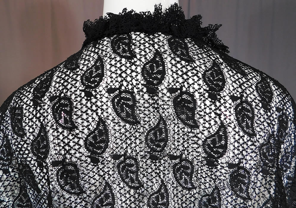 Victorian Antique Black Lace Dolman Mantle Pelerine Shawl Cloak Cape
The cape measures 40 inches long in the front, 28 inches long in the back and 20 inches across the back shoulders.