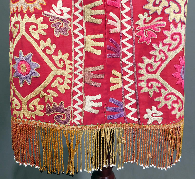 Vintage Antique Uzbekistan Suzani Embroidered Tribal Textile Half Apron Skirt
The apron measures 23 inches long, with an additional 3 inch fringe along the bottom and is 22 inches wide, 75 inches with the waist ties.