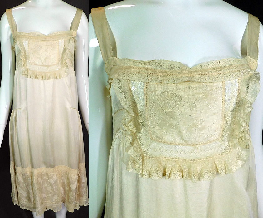 Vintage Cream Silk Damask Butterfly Rosette Lace Lingerie Negligee Chemise Slip Dress
This vintage cream silk damask butterfly rosette lace lingerie negligee chemise slip dress dates from the 1920s. It is made of an off white cream color silk fabric with damask weave woven butterfly design on the front top and bottom skirt, lace trim edging and a silk ribbon rosette flower trim on the bottom side skirt. 