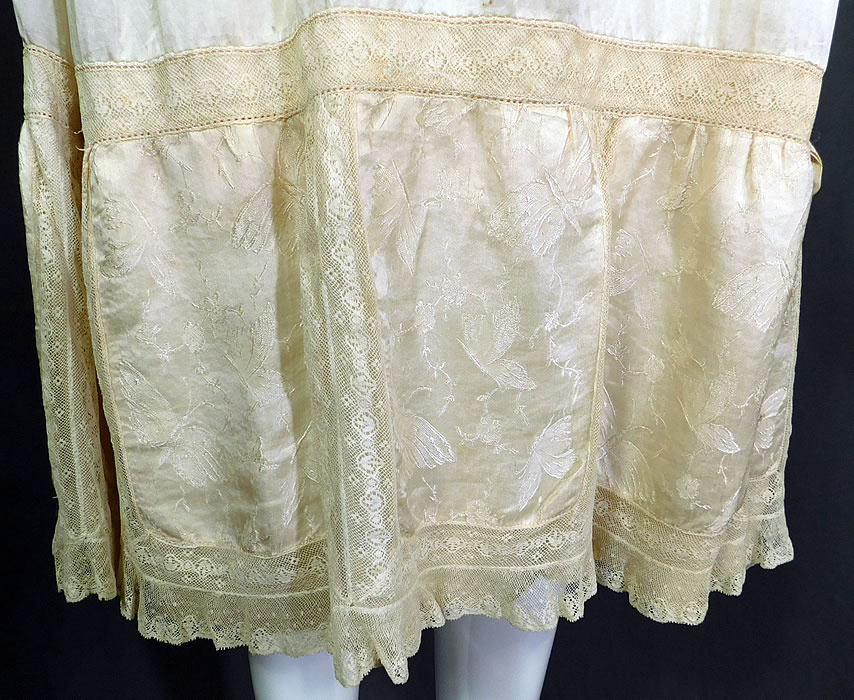 Vintage Cream Silk Damask Butterfly Rosette Lace Lingerie Negligee Chemise Slip Dress
It is in good condition, with only a frayed open seam underneath the layered skirt bottom ruffle lining. This is truly a wonderful piece of flapper lingerie wearable art! 