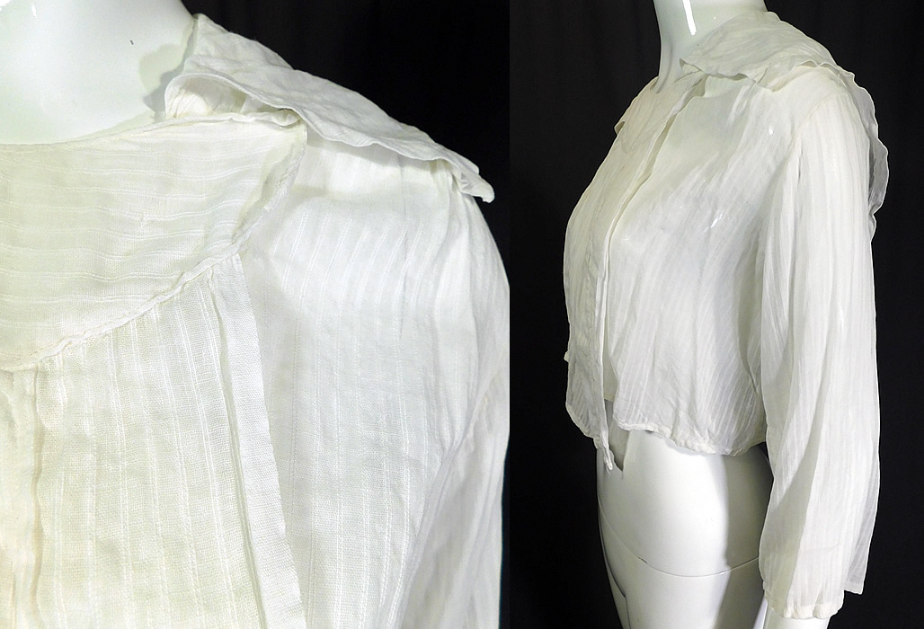 Edwardian White Cotton Batiste Striped Sailor Collar Middy Blouse Shirt
It is made of a sheer white cotton batiste fabric with a woven striped pattern. This womens middy blouse has a loose fitting short cropped sporty style, with a sailor collar back, long full sleeves, a pleated front with a single snap closure at the neck and is sheer, unlined. 